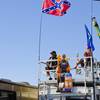NASCAR fans sit on top of their RV to watch the qualifying rounds at the Las Vegas Motor Speedway, Friday March 9, 2012.